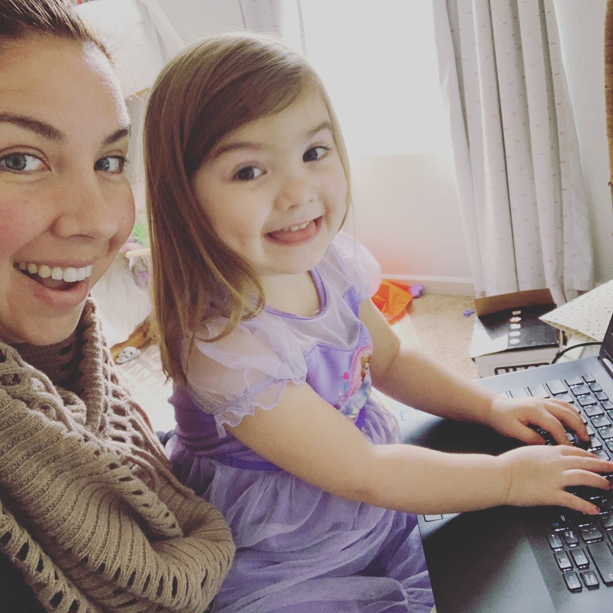 mom and daughter on computer