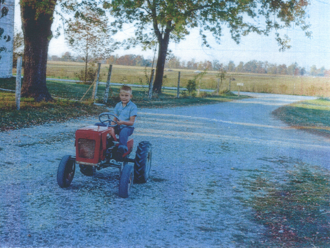 boy on tractor
