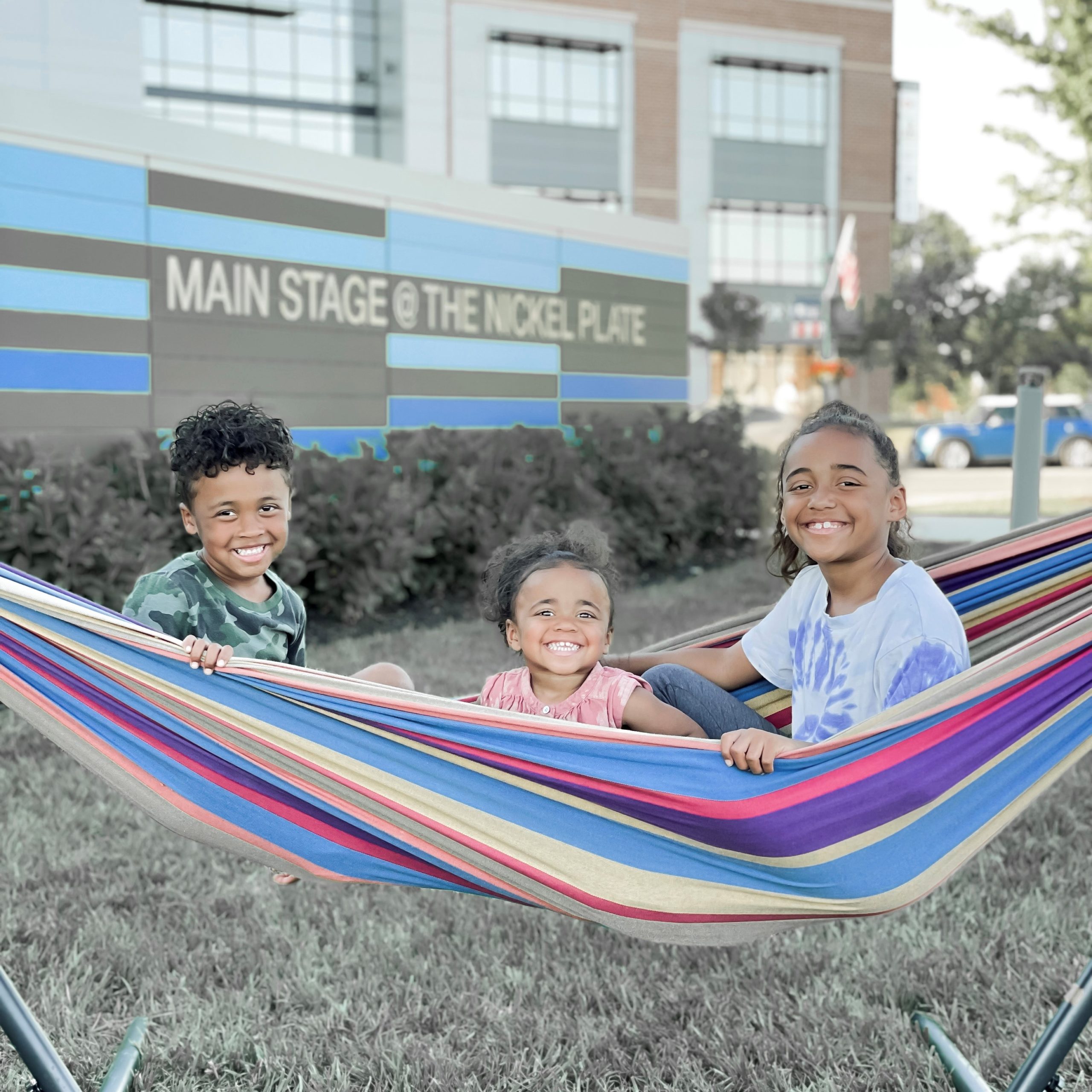 three kids in a hammock