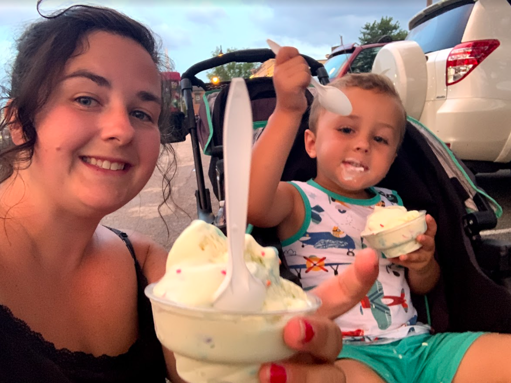 a mom and her child posing with vanilla ice cream