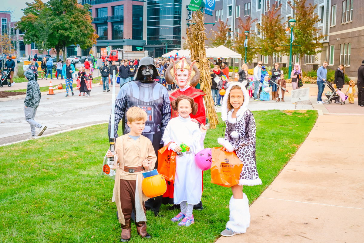 a group of kids dressed up as star wars characters