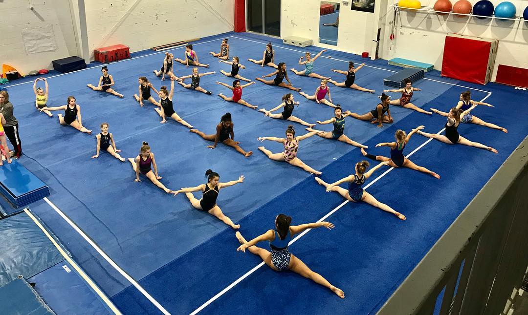 gymnasts doing the splits