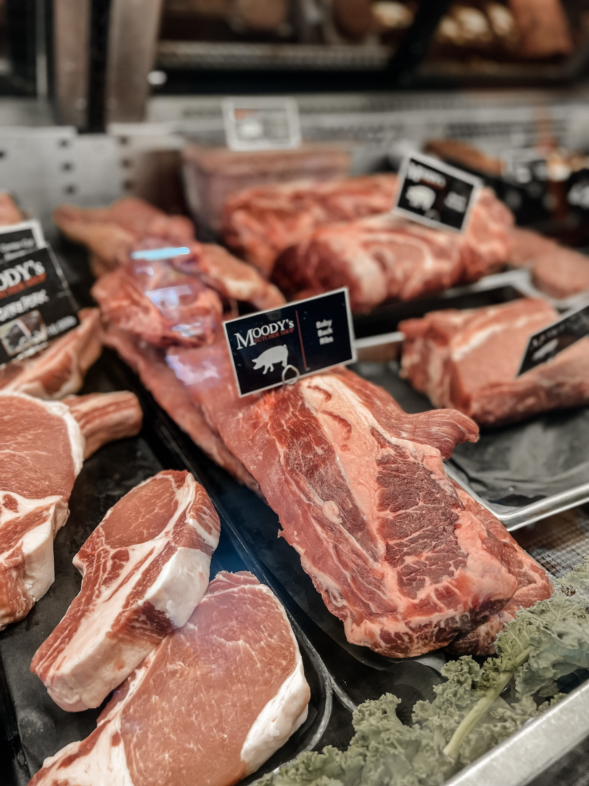 a close up of meat in a store