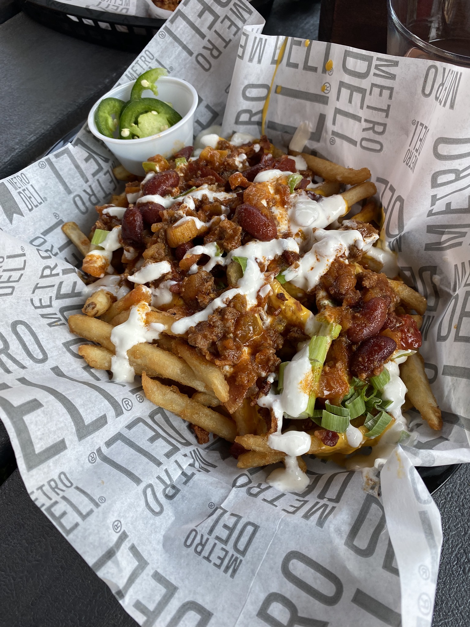 a basket of loaded fries