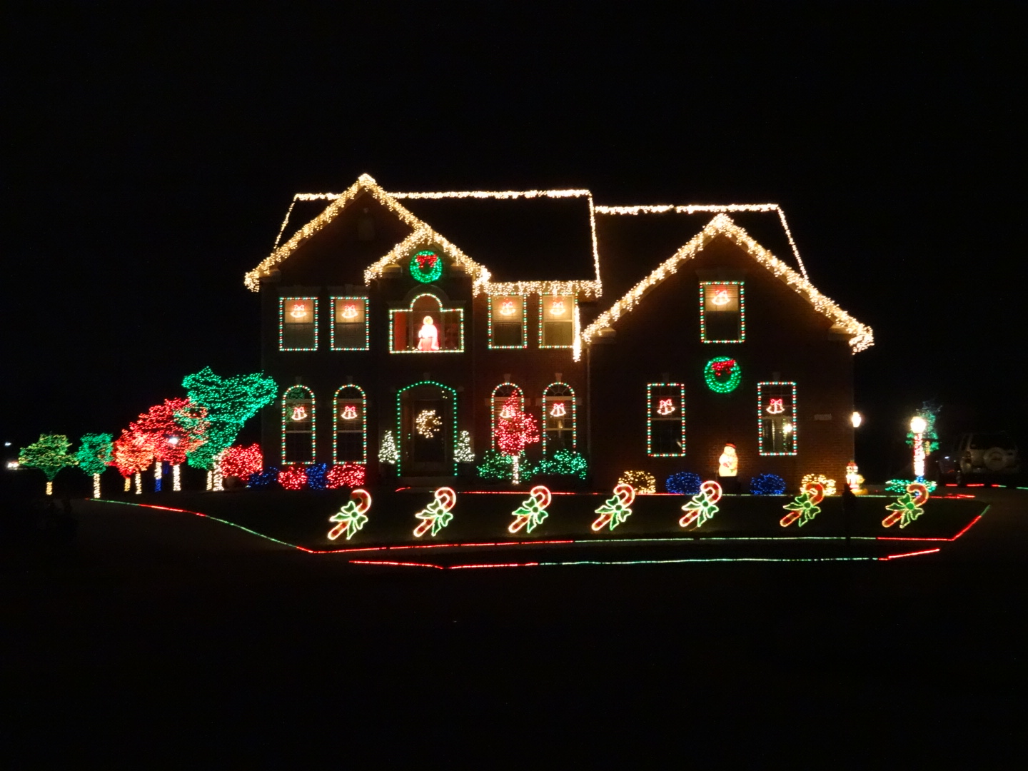 a house decorated with christmas lights