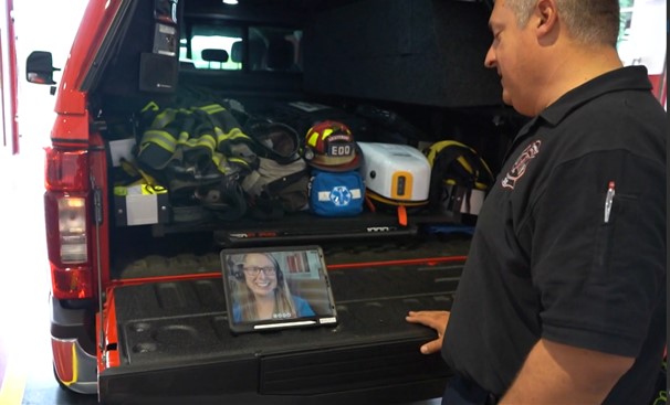 first responder looking at tablet