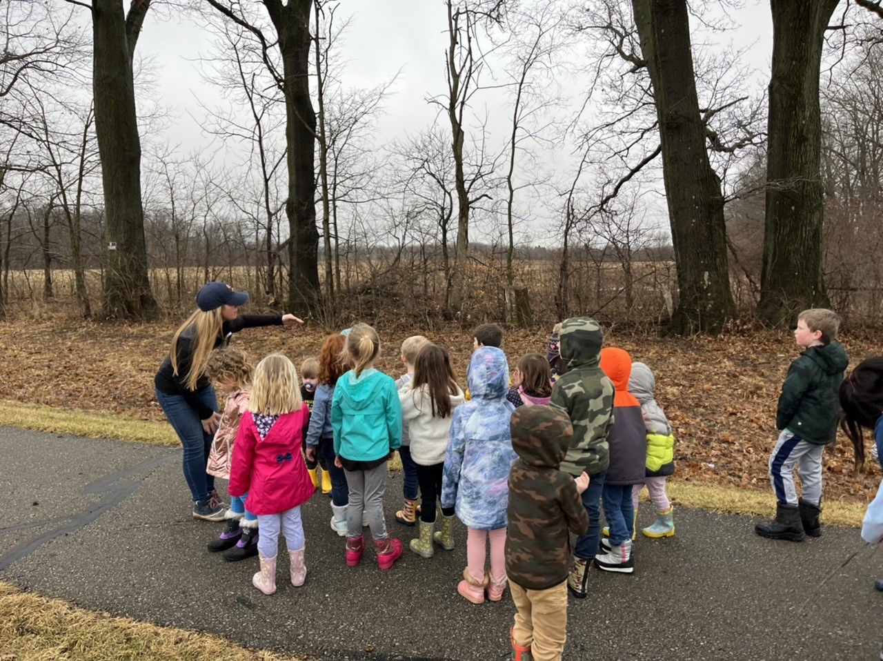 group of children near trees