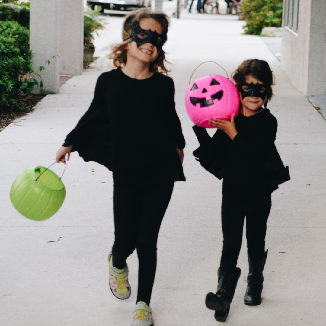 two girls trick or treating
